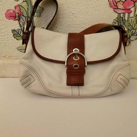 Coach Handbags - Coach white with tan Buckle shoulder bag
